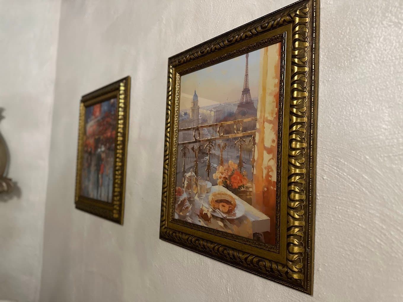 Gold-framed Paris artwork close-up